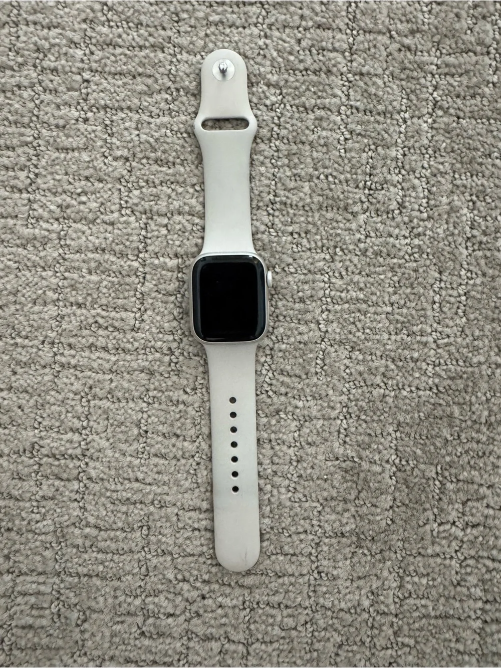 Apple Smartwatch with White Silicone Band and Silver Case